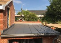 flat zinc roof repair in halstead