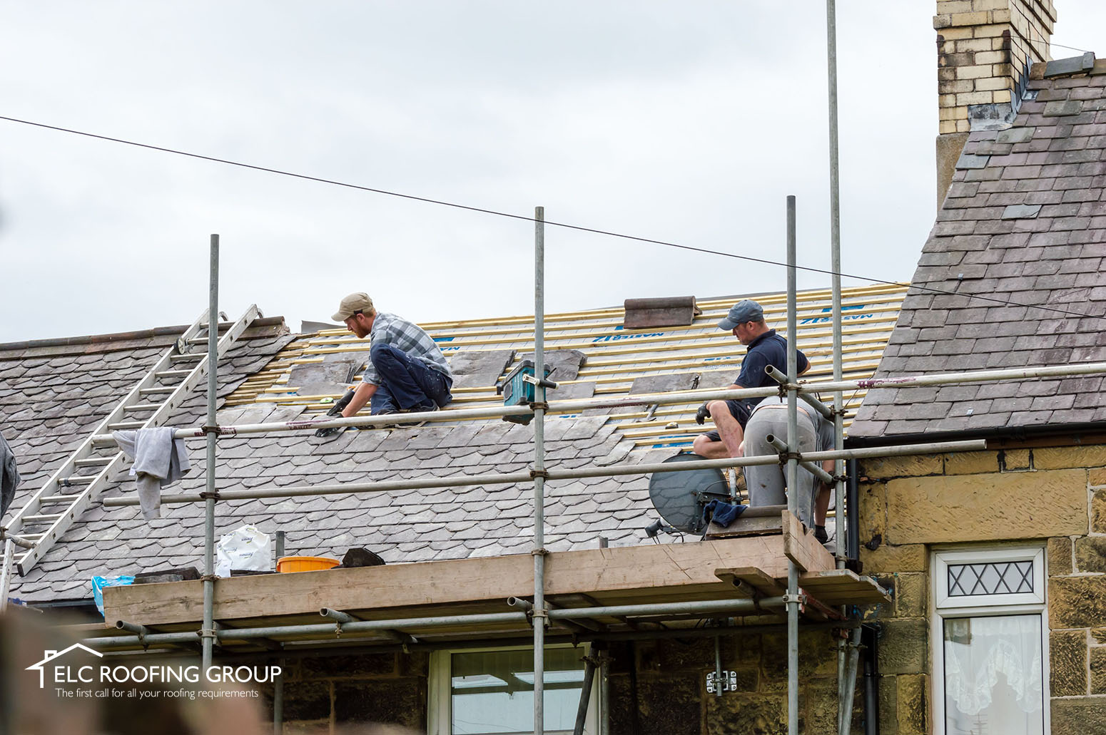 ELC team repairing a slate and tile roof